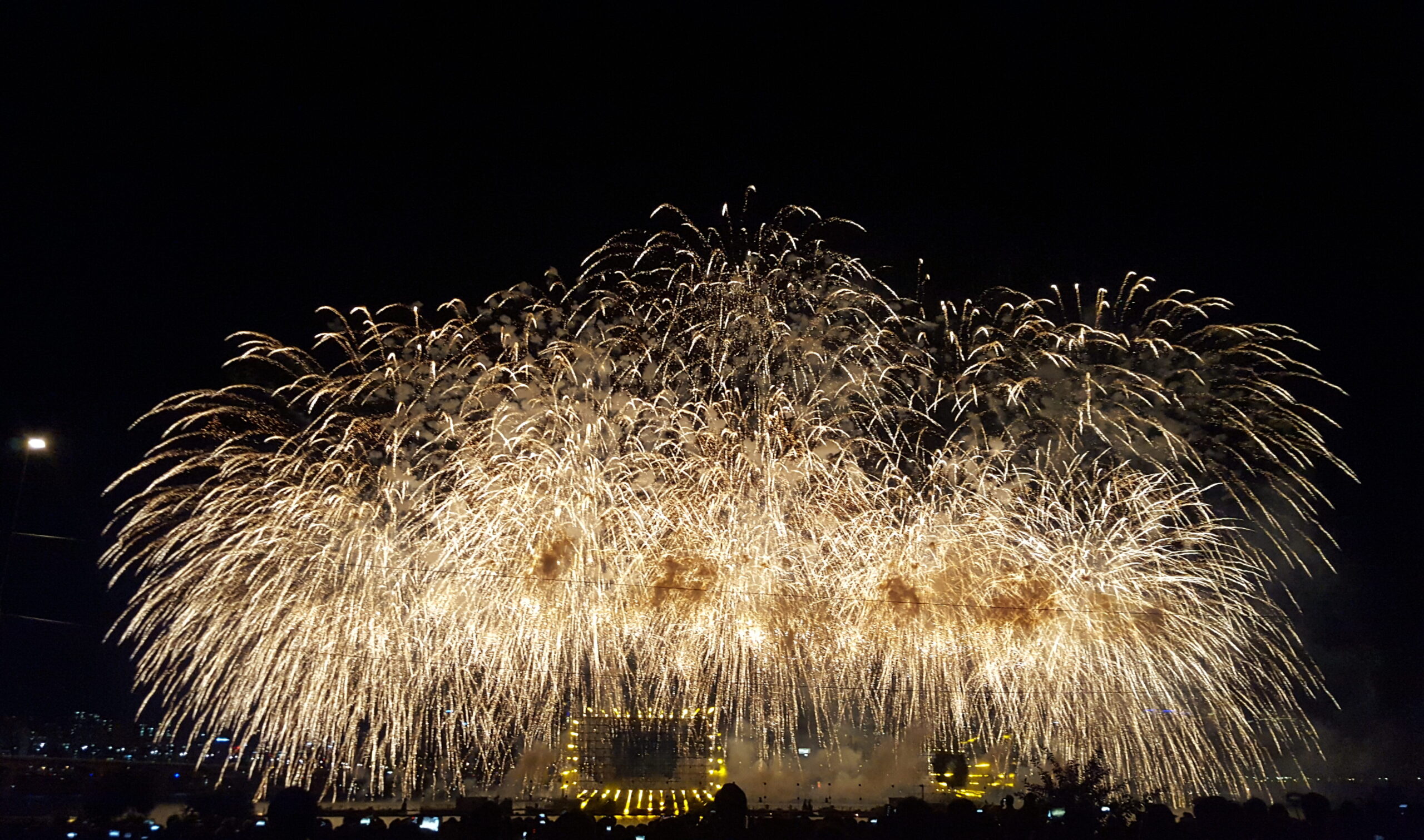Golden fireworks over the Han River during the Seoul International Fireworks Festival