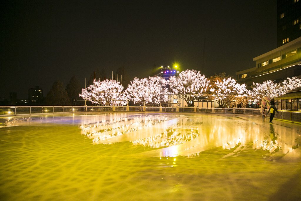 Outdoor ice skating rink illuminated by winter lights in Seoul