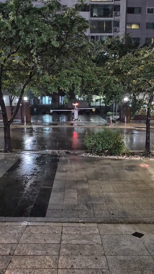 Rain-soaked street in Seoul during Korea’s summer monsoon season