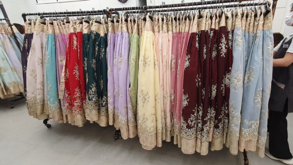 Colorful embroidered hanbok skirts available for rent near Gyeongbokgung
