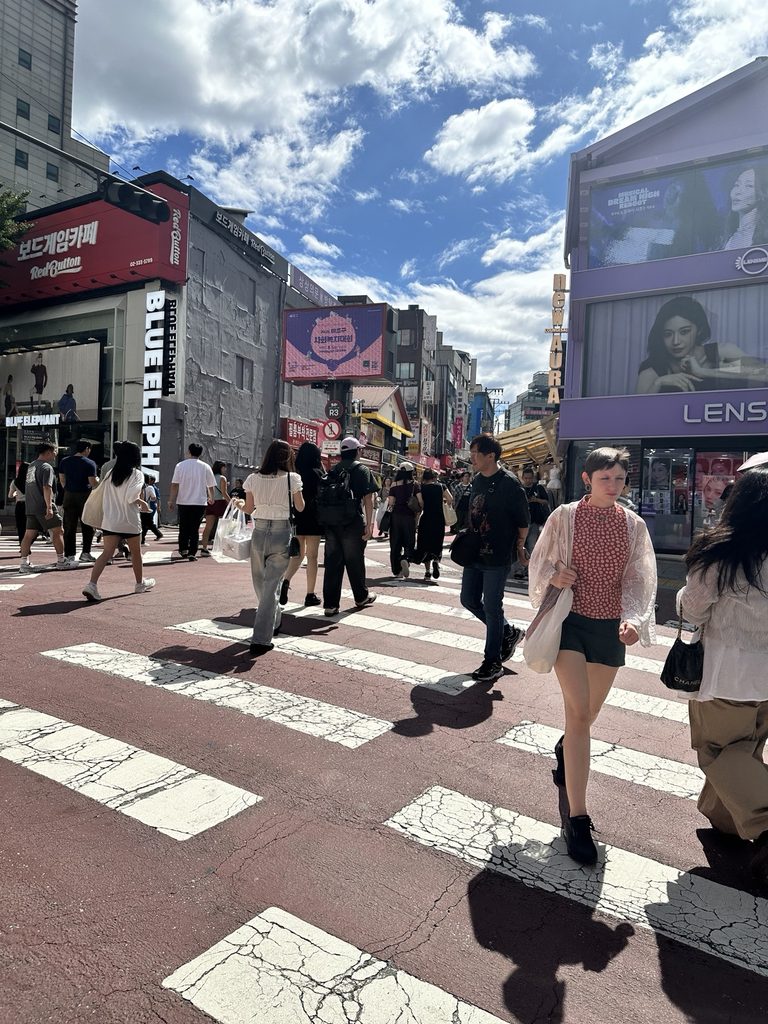 Busy pedestrian street in Hongdae, Seoul