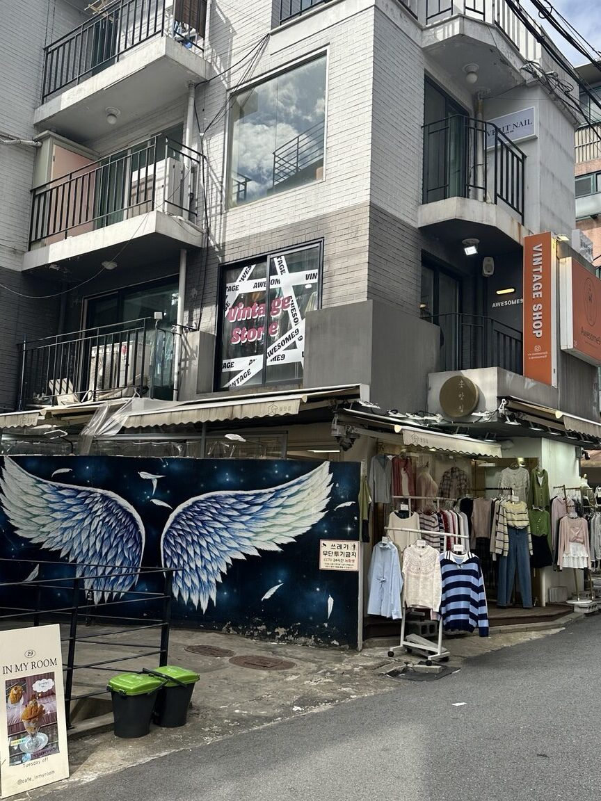 Small shops and low-rise buildings on a Yeonnam-dong street