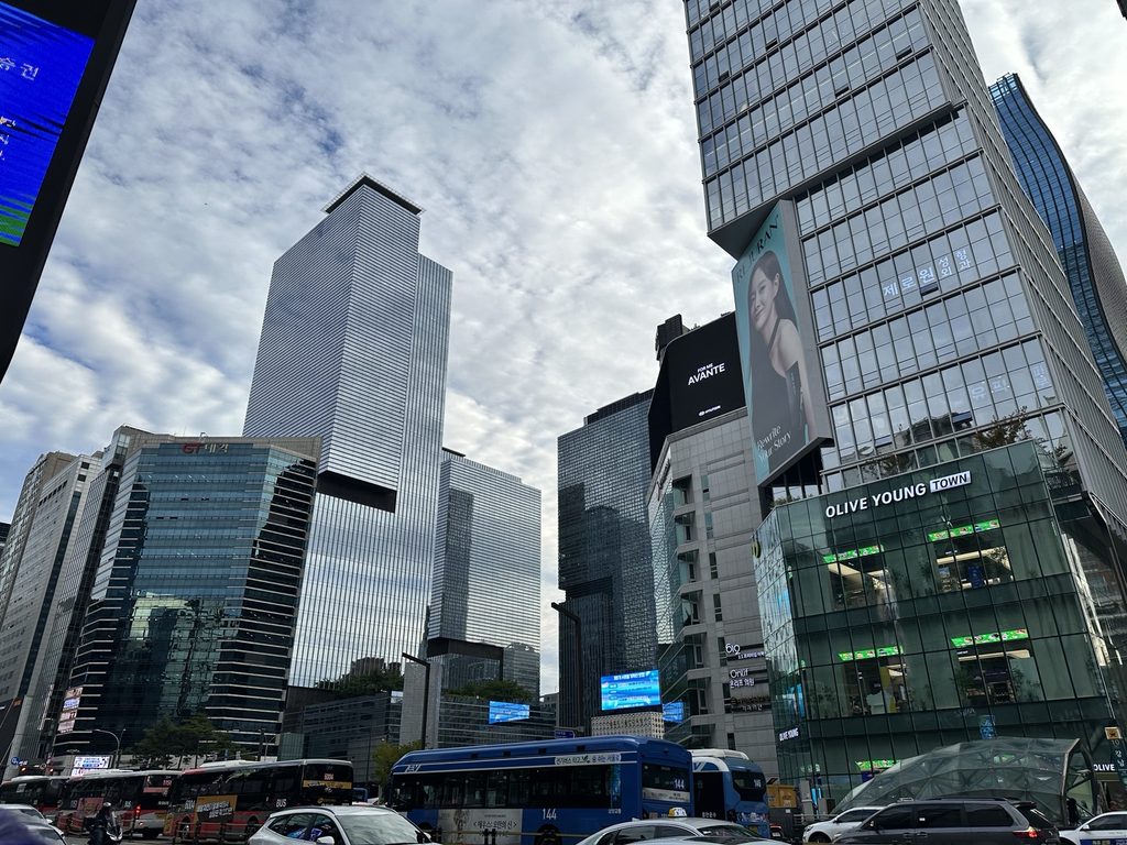 High-rise buildings, traffic and shops around Gangnam Station in Seoul